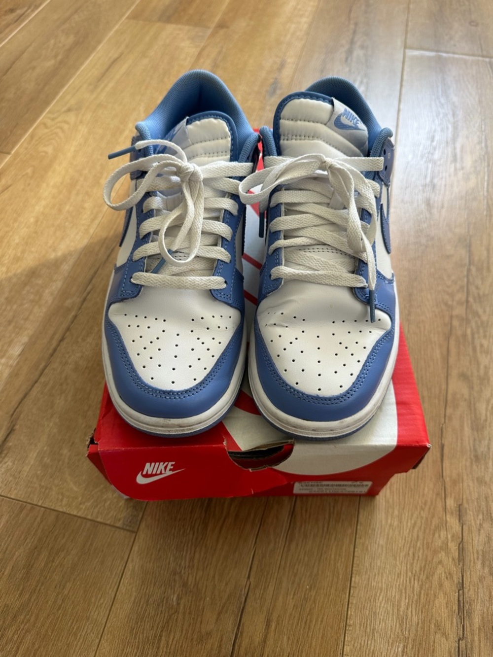 Nike Low-Top Sneakers in White and Light Blue with Navy Swoosh